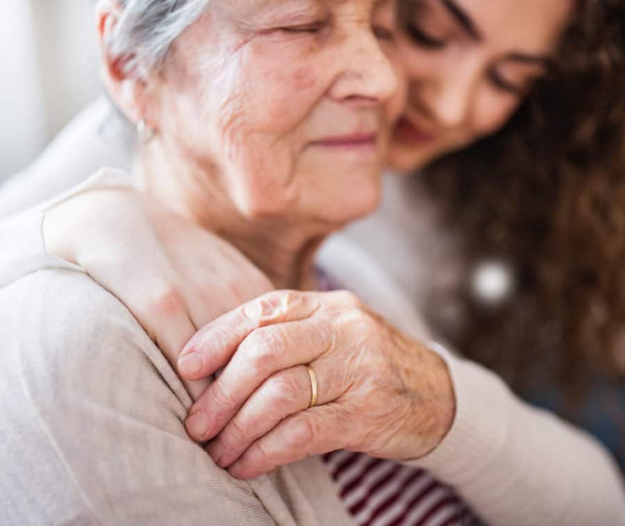 Girl With Grandmother At Home